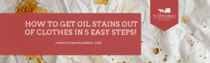 A stained cloth background with text: "How to get oil stains out of clothes in 5 easy steps!" and "thedutchmanslaundry.com" with a logo. how to get oil out of clothes.