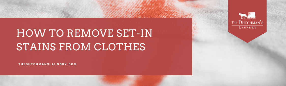 A banner with the text "How to remove set-in stains from clothes" and "The Dutchman's Laundry" logo on a blurred background of stained fabric.