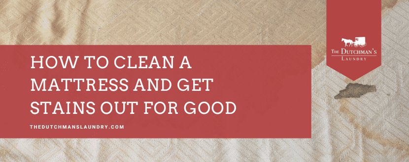 A stained mattress with a red banner that reads, "How to clean a mattress and get stains out for good," alongside The Dutchman's Laundry logo.