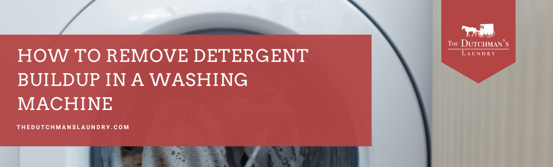 Front of a washing machine with text overlay: “How to remove detergent buildup in a washing machine. The Dutchman’s Laundry.”.